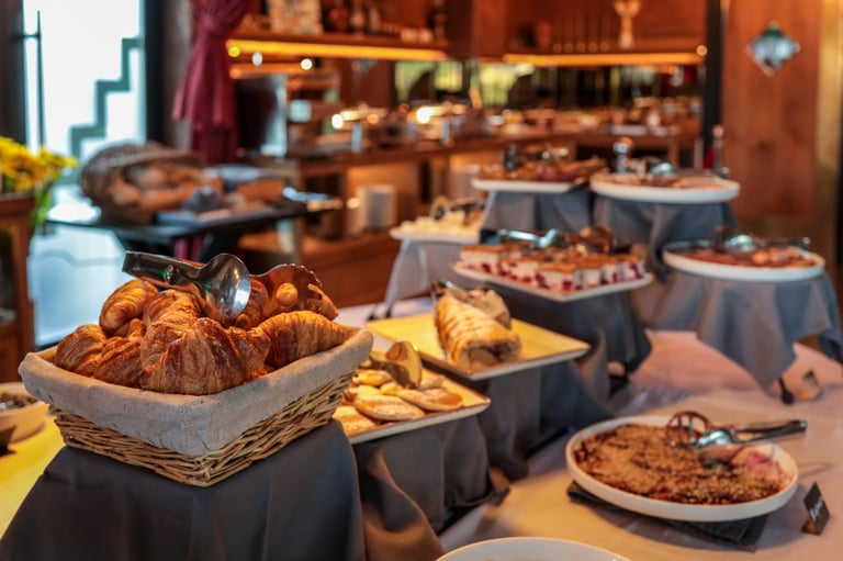 Hotel breakfast buffet with croissants and pastries