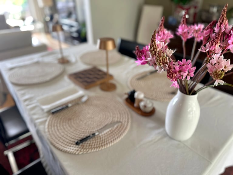 Beautiful dinner table with colorful flowers